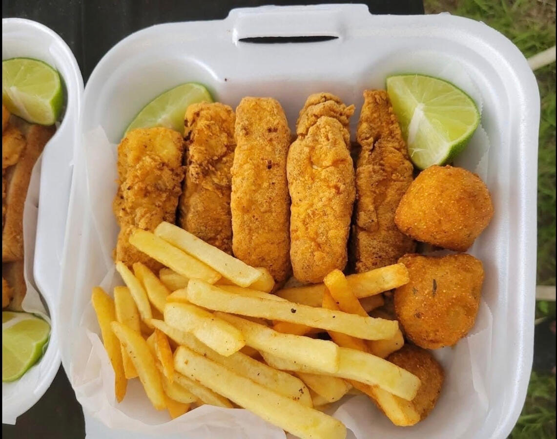 Aunt Lily’s Kitchen & Catering tilapia fish, fries, and hush puppies. Aunt Lily’s Kitchen & Catering tilapia fish, fries, and hush puppies.