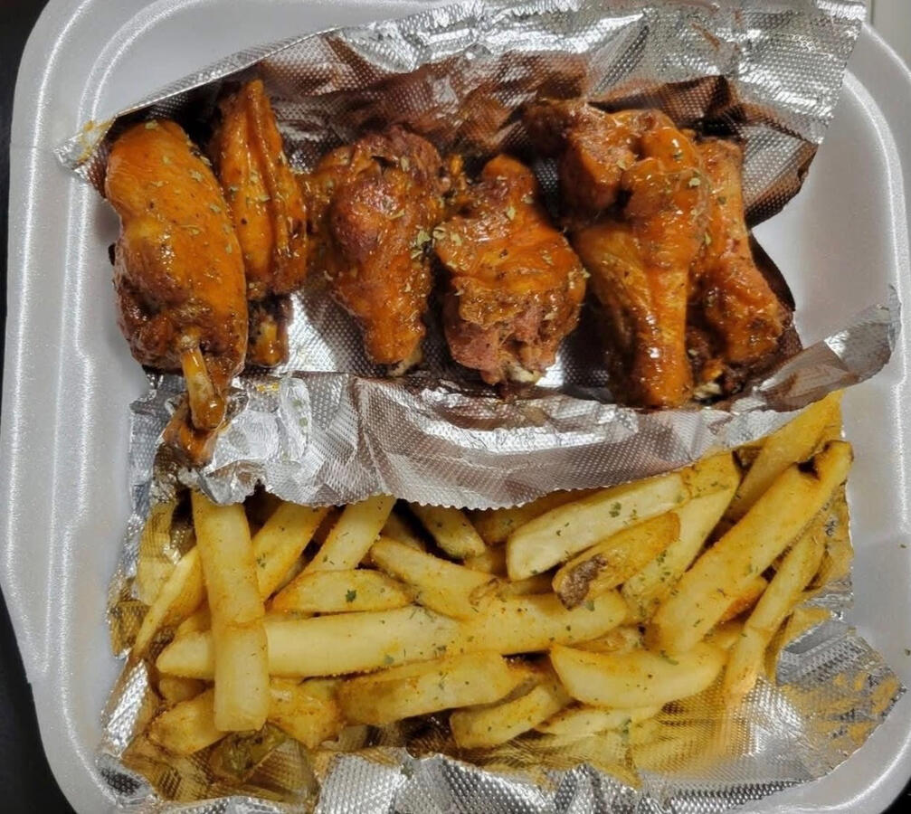 Aunt Lily’s Kitchen & Catering Flavored Wings & Fries. Aunt Lily’s Kitchen & Catering Flavored Wings & Fries.